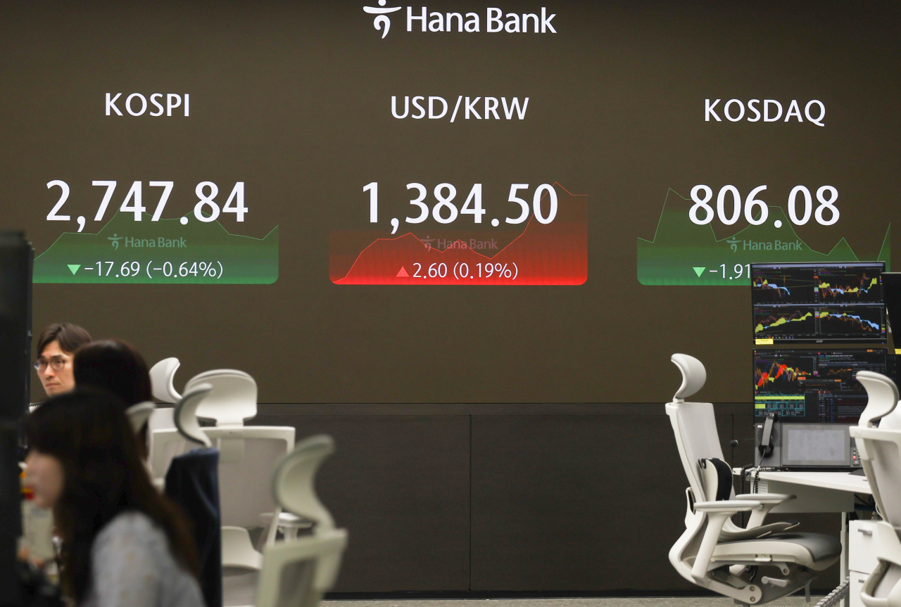 Seoul shares open lower ahead of Fed rate decision, earnings